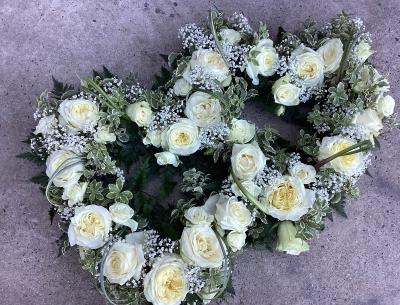 Loose entwined open hearts