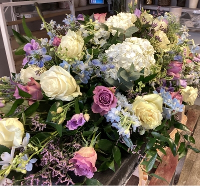 Mauve, Blue and White Casket Spray