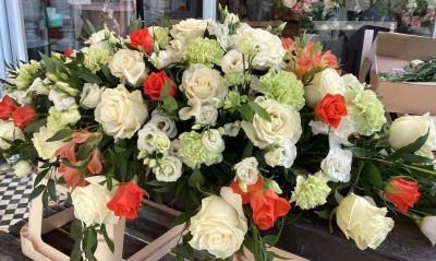 White and Orange Rose Casket Spray