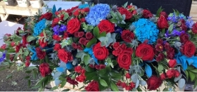 Red and blue casket spray