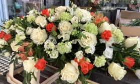White and Orange Rose Casket Spray